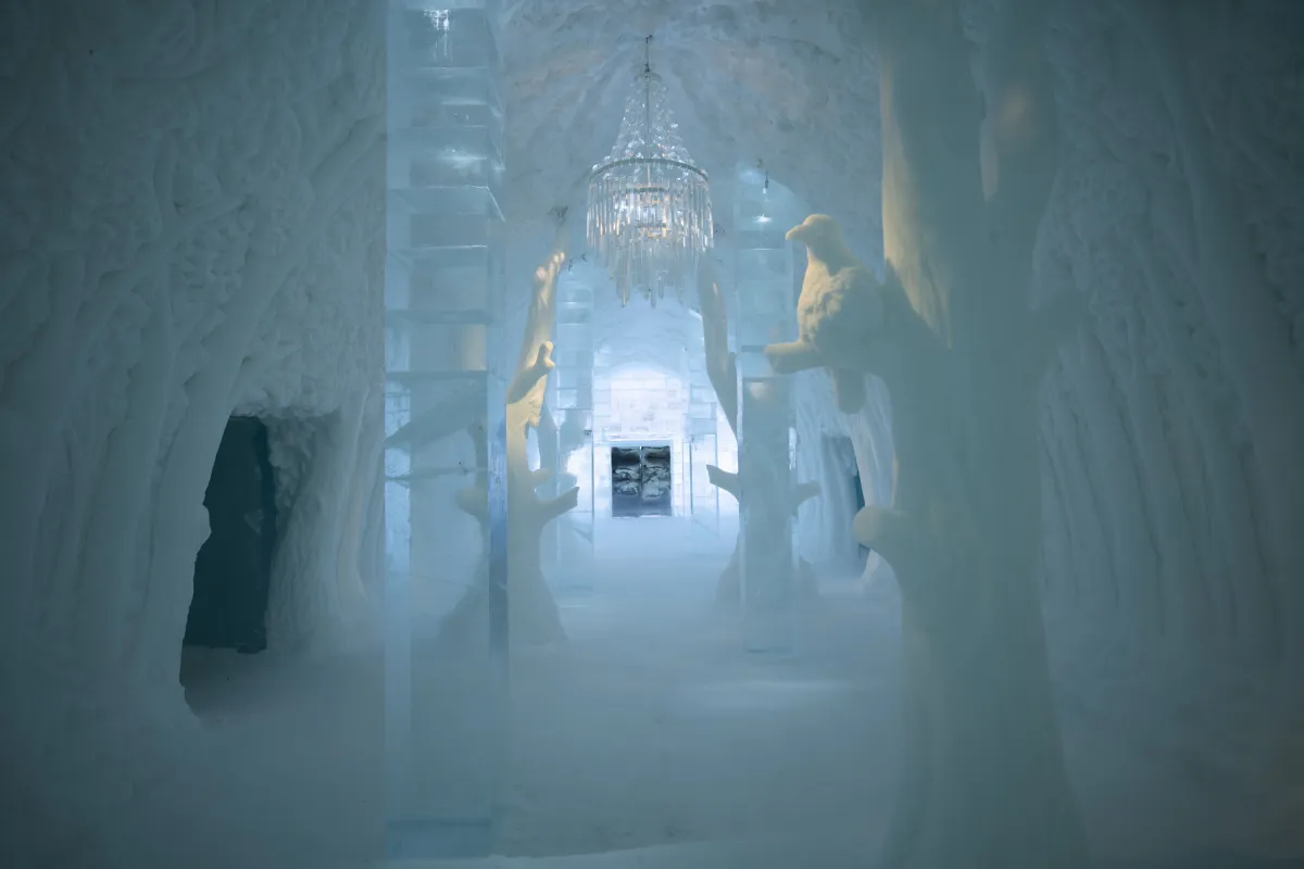 Carved snow hall lit in pale blue light